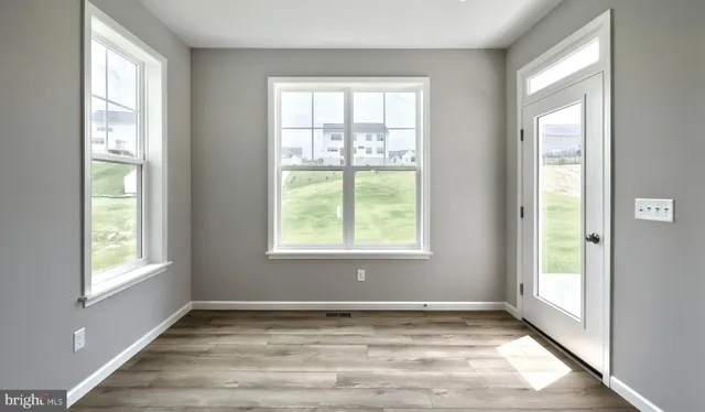 a view of an empty room and window