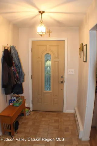 a view of a hallway with entryway