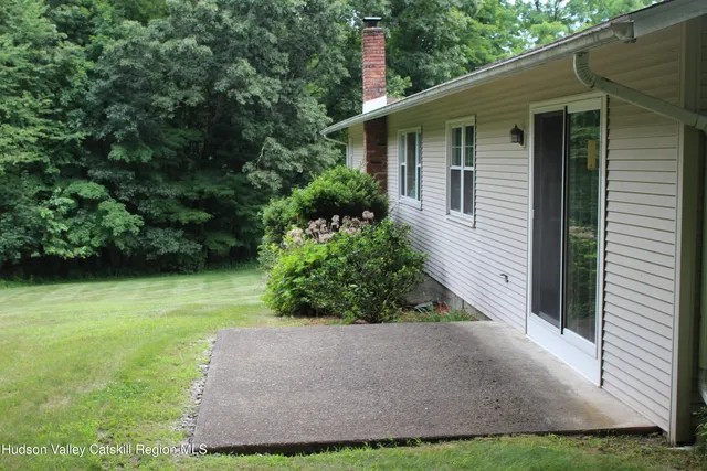 a view of a back yard of the house