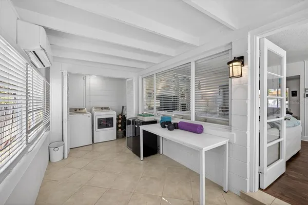a kitchen with a stove cabinets and refrigerator