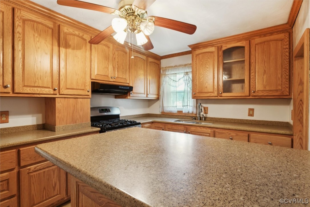 456 Queens Creek Road Williamsburg, VA 23185 - Photo 26 of 44 a kitchen with stainless steel appliances granite countertop a sink a stove and cabinets