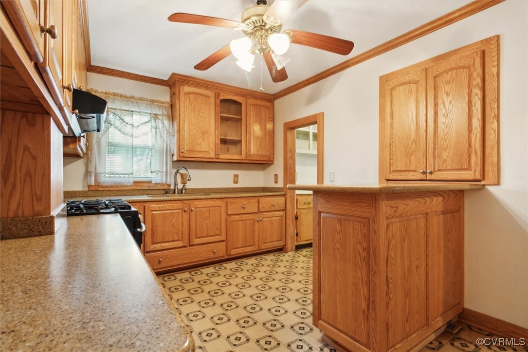 456 Queens Creek Road Williamsburg, VA 23185 - Photo 27 of 44 a kitchen with sink cabinets and window