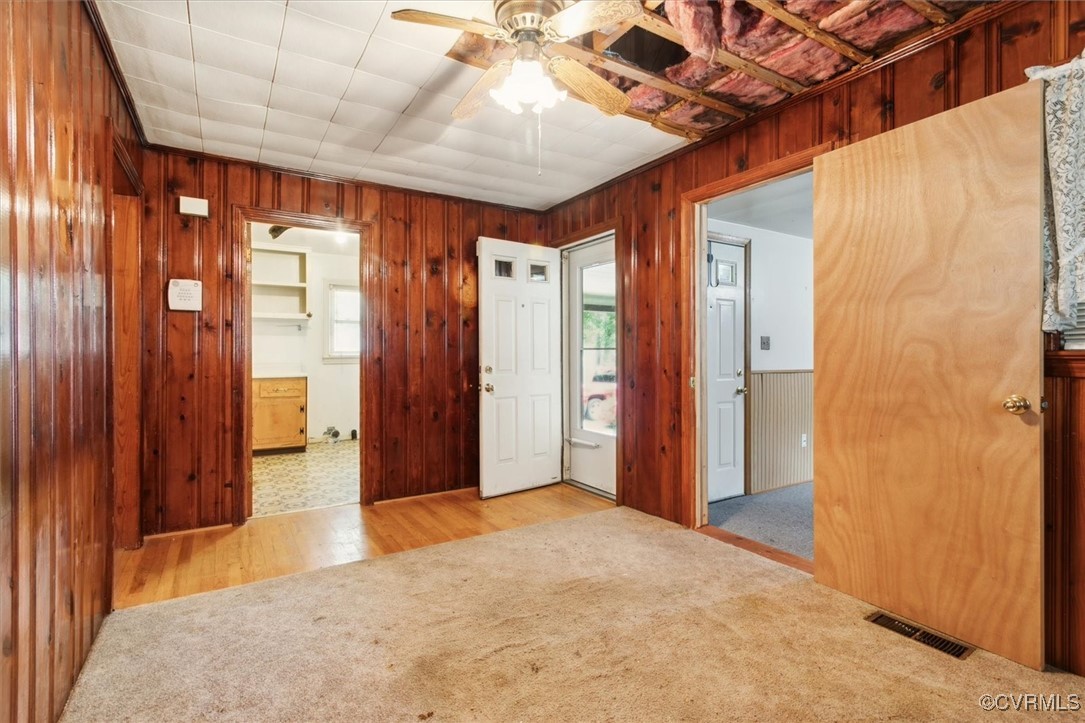 456 Queens Creek Road Williamsburg, VA 23185 - Photo 31 of 44 a big room with wooden floor and windows