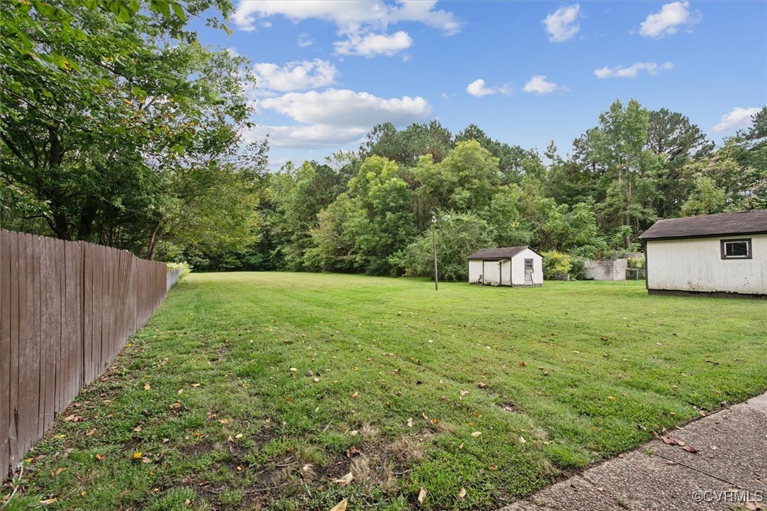 456 Queens Creek Road Williamsburg, VA 23185 - Photo 38 of 44 a view of a yard with a tree