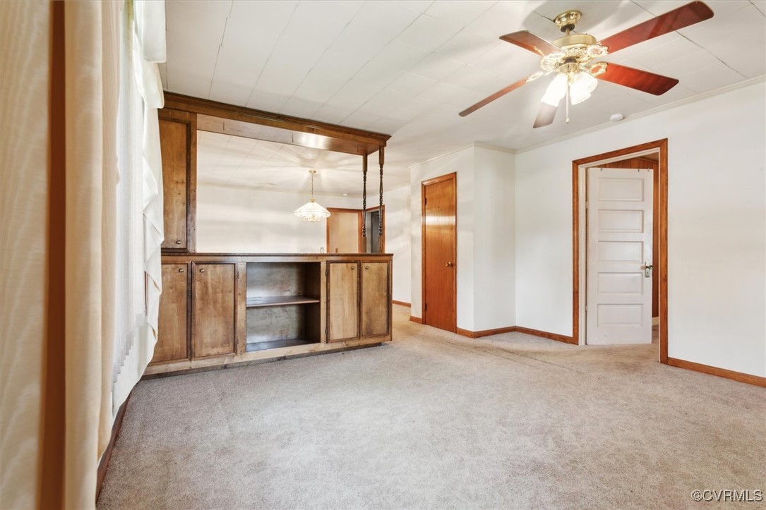 456 Queens Creek Road Williamsburg, VA 23185 - Photo 6 of 44 a view of empty room with a ceiling fan and window