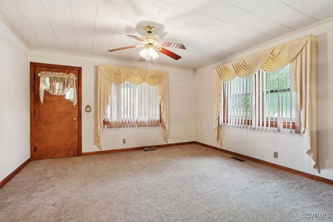 456 Queens Creek Road Williamsburg, VA 23185 - Photo 8 of 44 a view of an empty room with a window
