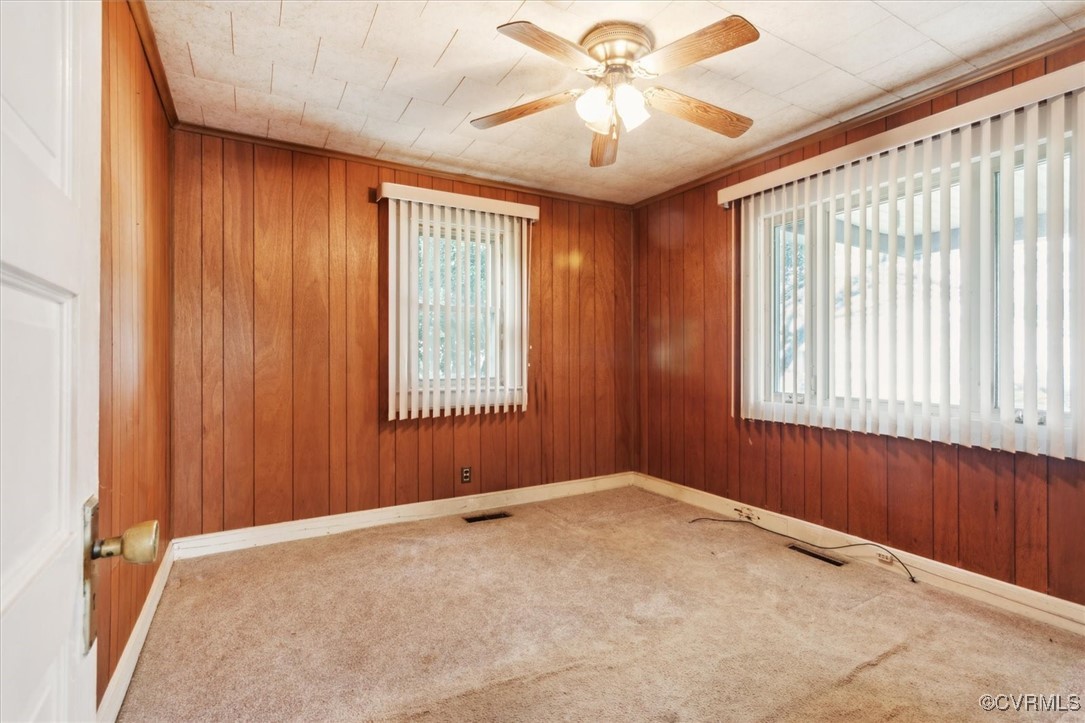 456 Queens Creek Road Williamsburg, VA 23185 - Photo 10 of 44 an empty room with windows