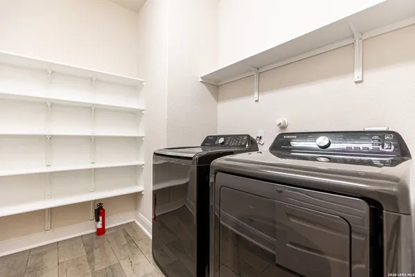 a utility room with dryer and washer
