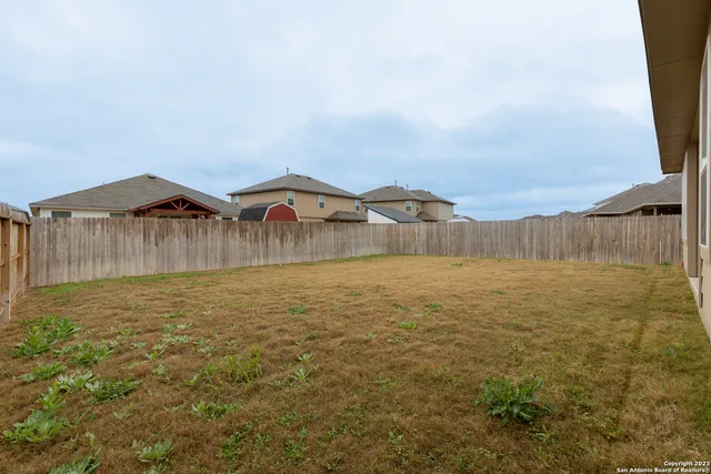 a house view with a garden space