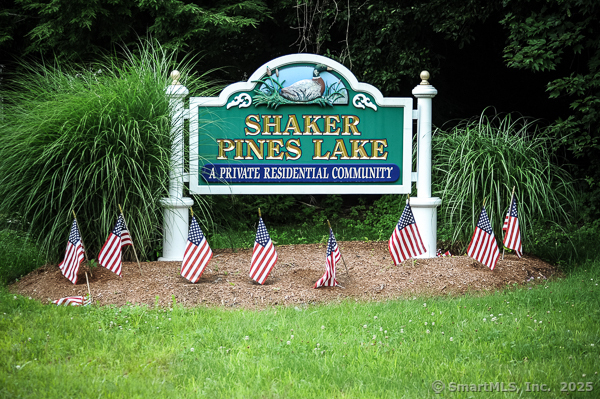 a view of a park with a table and chairs