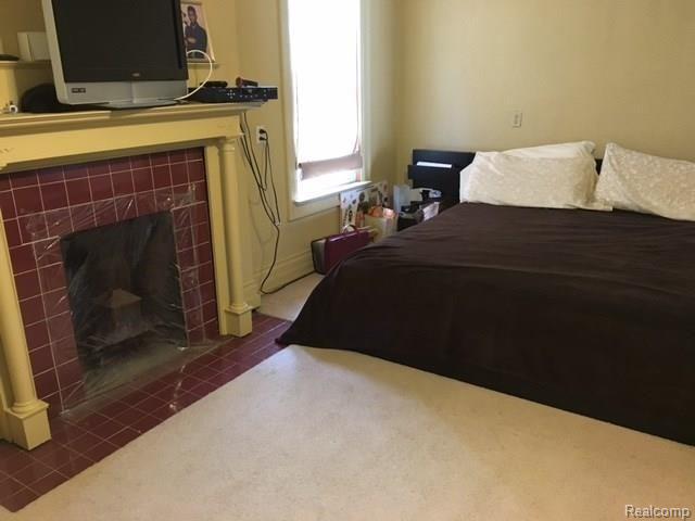 110 Atkinson Street Detroit, MI 48202 - Photo 18 of 18 110 Atkinson- Master Bed FP.JPG