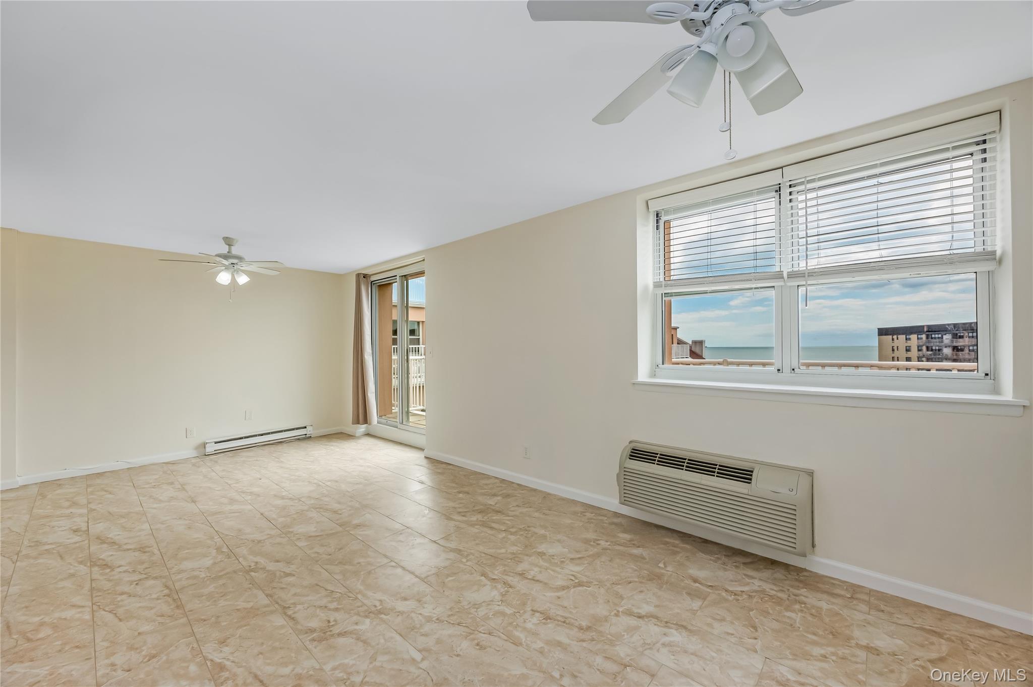 2 Richmond Road, Unit 6M Lido Beach, NY 11561 - Photo 9 of 21 a view of an empty room with a window
