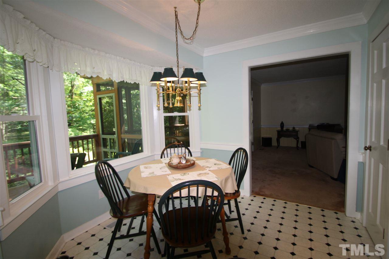 8624 Langtree Lane Raleigh, NC 27613 - Photo 9 of 25 Large bay window overlooking beautiful yard