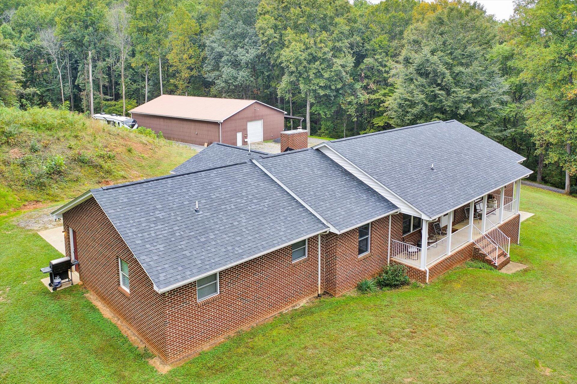 415 Eton Road Hardy, VA 24101 - Photo 1 of 44 an aerial view of a house with swimming pool next to a yard