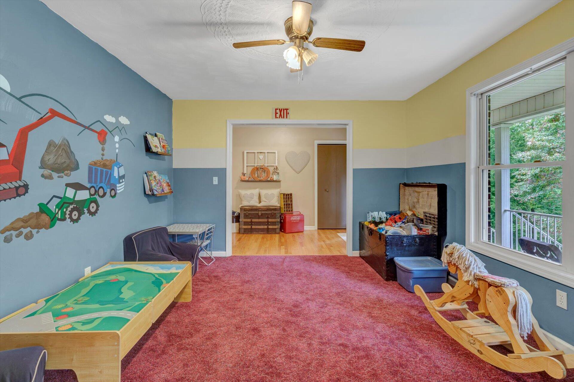 415 Eton Road Hardy, VA 24101 - Photo 12 of 44 a bedroom with furniture and a wooden floor