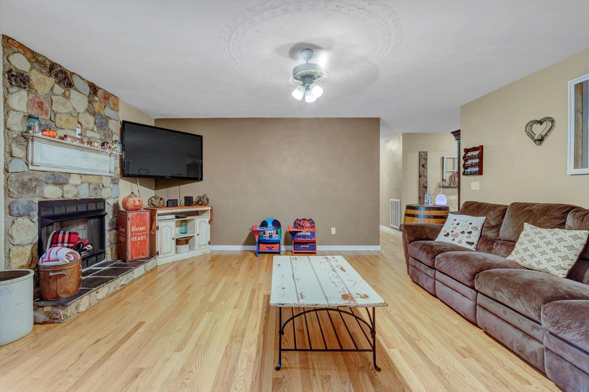 415 Eton Road Hardy, VA 24101 - Photo 19 of 44 a living room with furniture and a flat screen tv