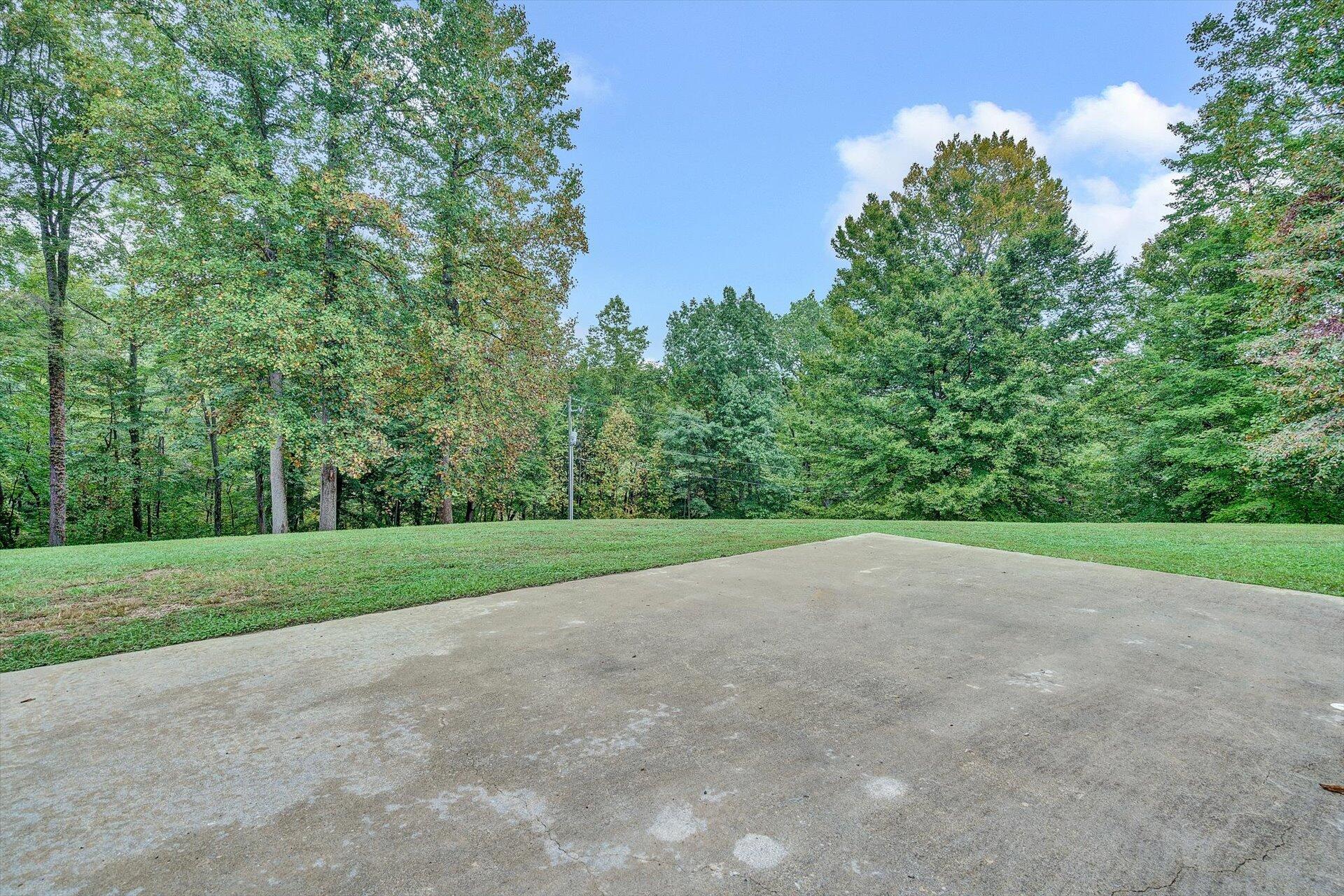 415 Eton Road Hardy, VA 24101 - Photo 35 of 44 a view of a field with trees in the background