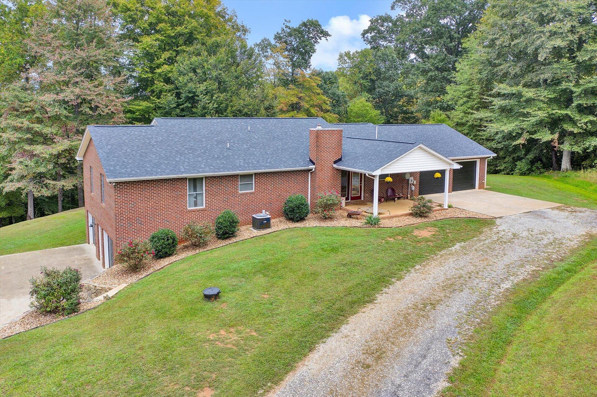 415 Eton Road Hardy, VA 24101 - Photo 36 of 44 a front view of a house with garden