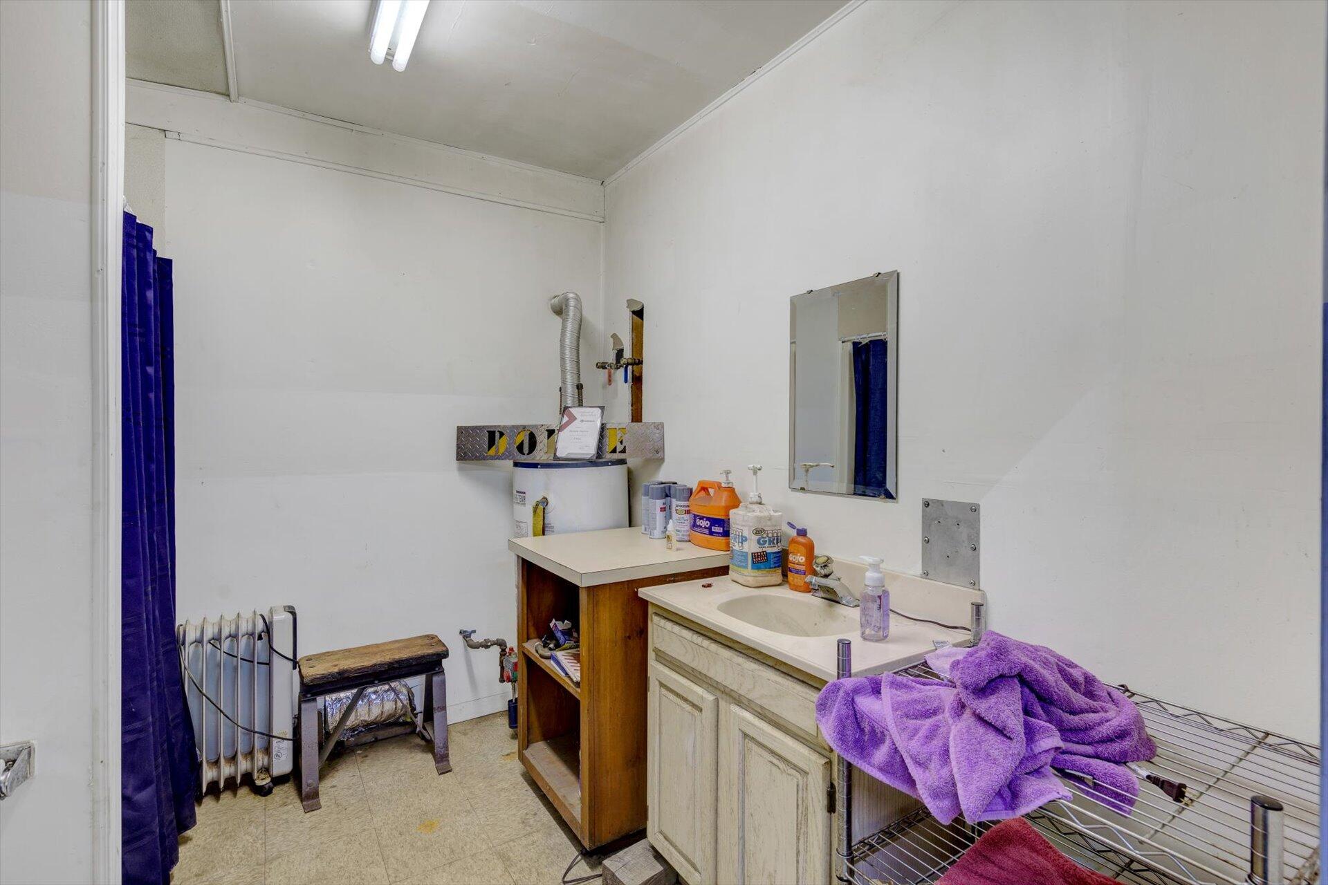 415 Eton Road Hardy, VA 24101 - Photo 41 of 44 a bathroom with a sink mirror and vanity