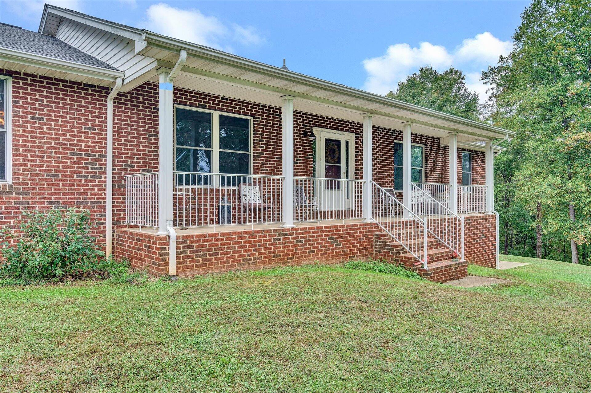 415 Eton Road Hardy, VA 24101 - Photo 6 of 44 a front view of a house with a yard