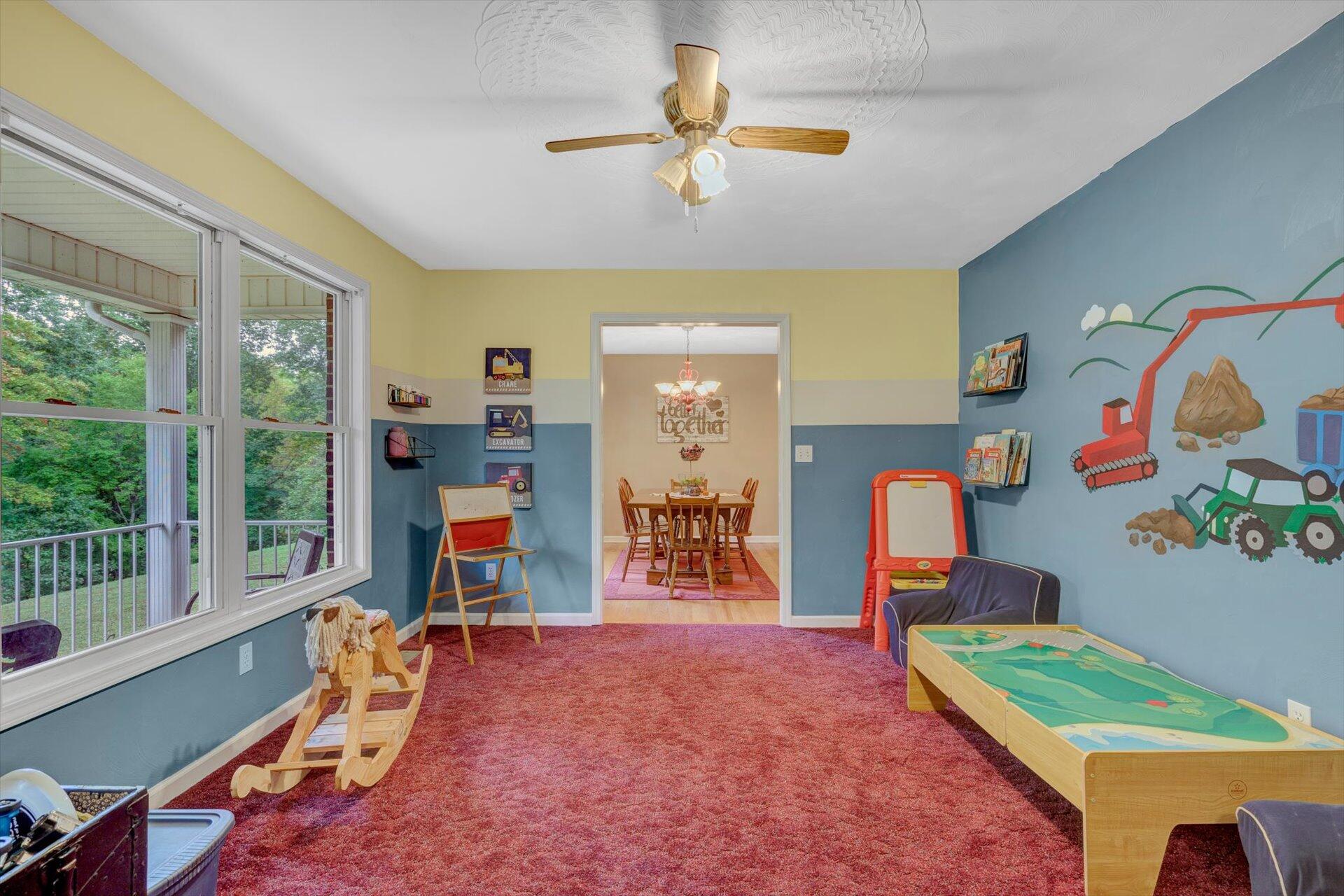 415 Eton Road Hardy, VA 24101 - Photo 10 of 44 a bedroom with furniture and a window