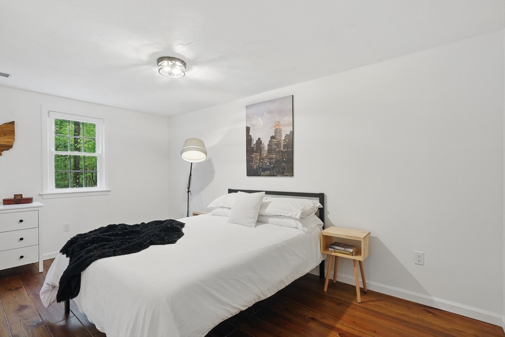 272 Bennett Road Hampden, MA 01036 - Photo 29 of 42 a bedroom with a bed and a window