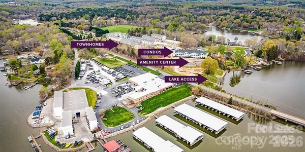 a aerial view of a house with a lake view