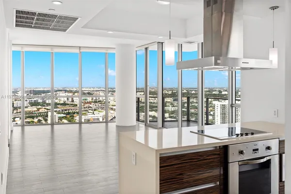 a view of a swimming pool with an outdoor seating