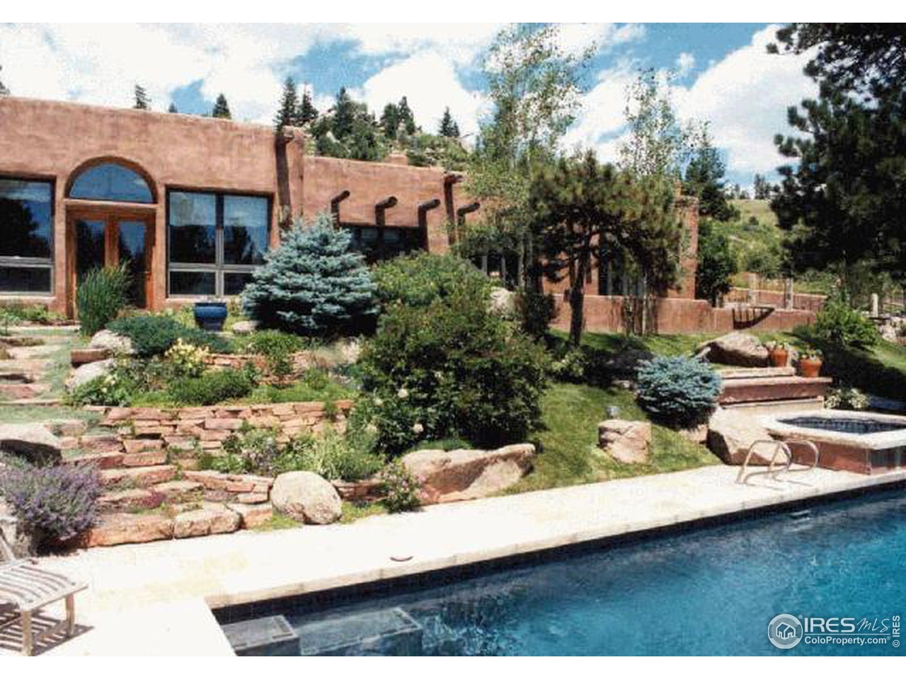 136 Old Post Office Road Boulder, CO 80302 - Photo 2 of 11 a view of house with outdoor space