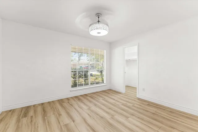 a view of an empty walk in closet