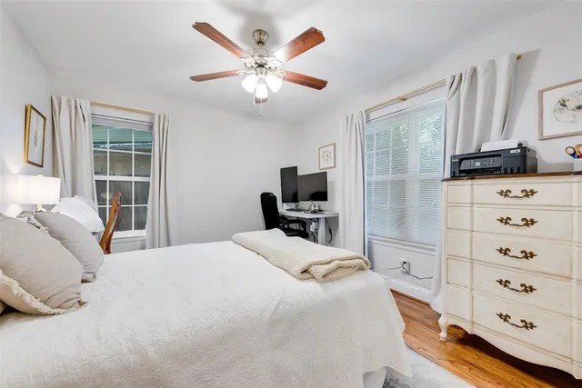 a bathroom with a shower and toilet