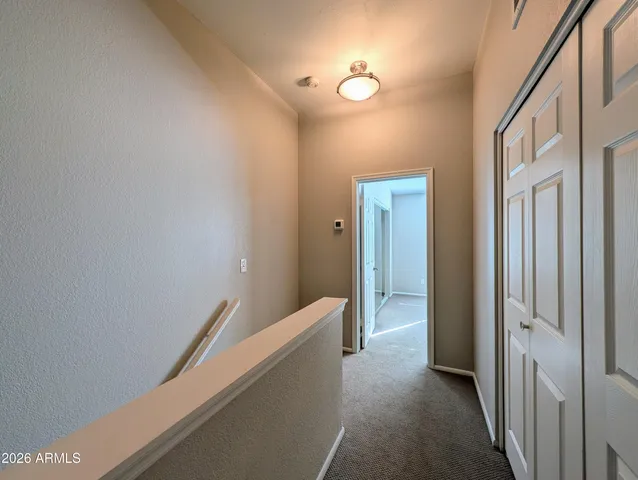 a view of hallway with shower