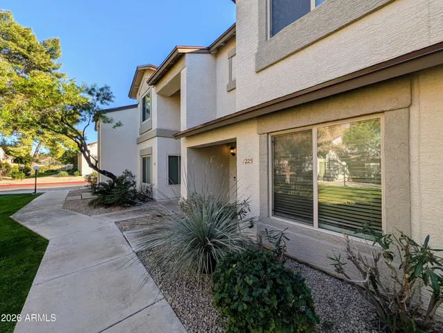 a house view with a garden space
