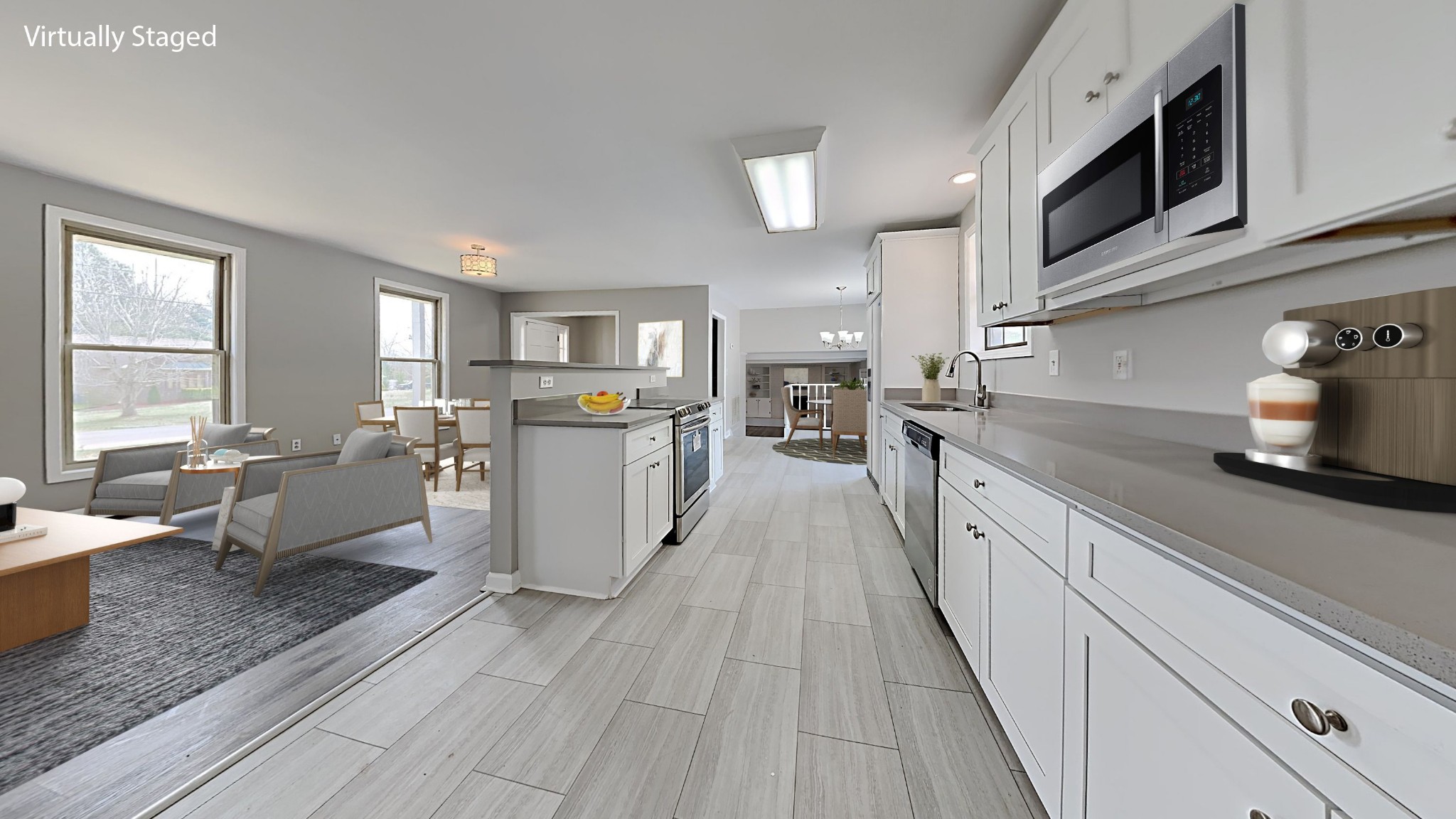 3549 Forest Park Road Springfield, TN 37172 - Photo 7 of 27 a kitchen with stainless steel appliances kitchen island granite countertop a refrigerator a sink dishwasher a stove with wooden cabinets and floor