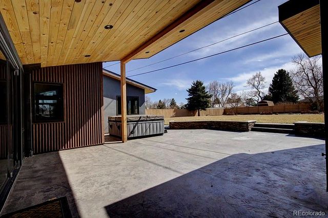 a view of swimming pool with seating space