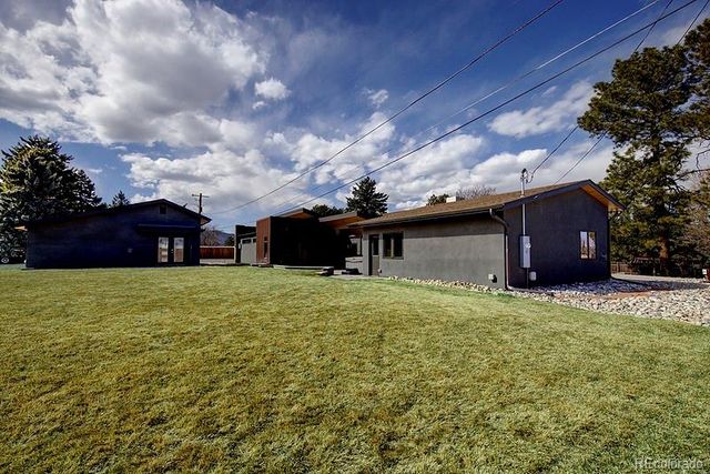 a house view with a garden space