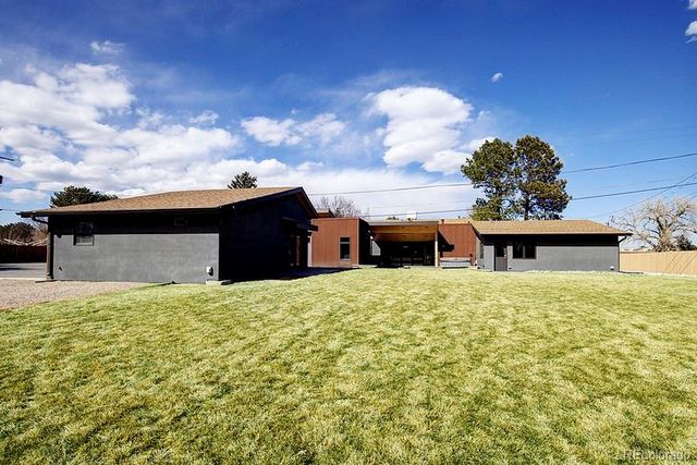 a house view with a garden space