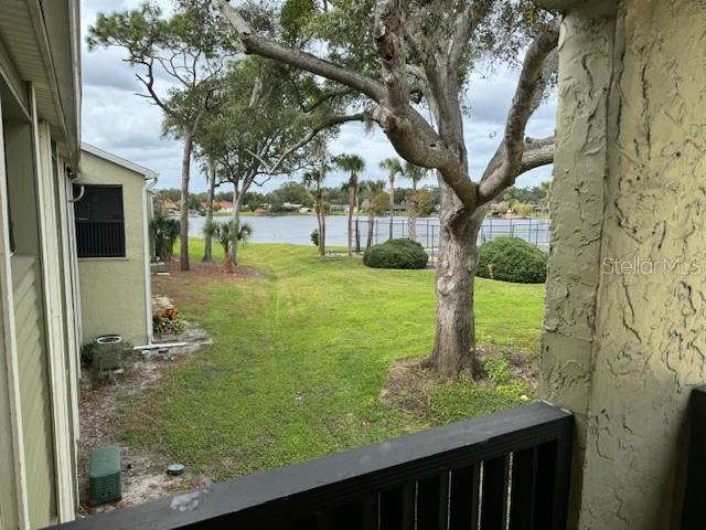 922 Lake Destiny Road, Unit F Altamonte Springs, FL 32714 - Photo 15 of 20 a view of a yard with plants and large trees