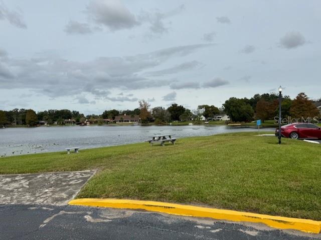 922 Lake Destiny Road, Unit F Altamonte Springs, FL 32714 - Photo 18 of 20 a view of a lake with a big yard