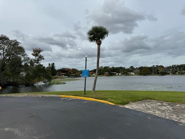 922 Lake Destiny Road, Unit F Altamonte Springs, FL 32714 - Photo 19 of 20 a view of a lake with a big yard