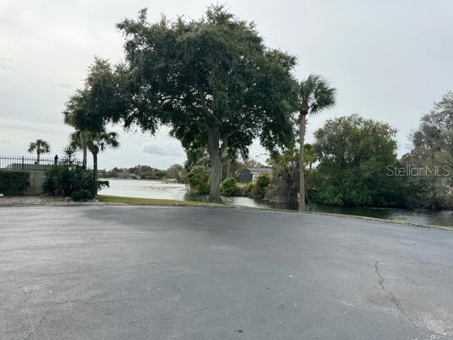 922 Lake Destiny Road, Unit F Altamonte Springs, FL 32714 - Photo 20 of 20 a view of a house with a yard and basketball court