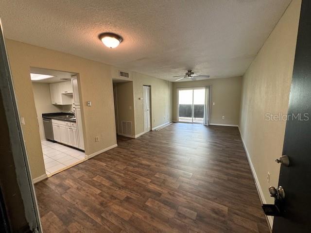 922 Lake Destiny Road, Unit F Altamonte Springs, FL 32714 - Photo 3 of 20 wooden floor in an empty room with a window