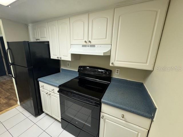 922 Lake Destiny Road, Unit F Altamonte Springs, FL 32714 - Photo 6 of 20 a kitchen with appliances and cabinets