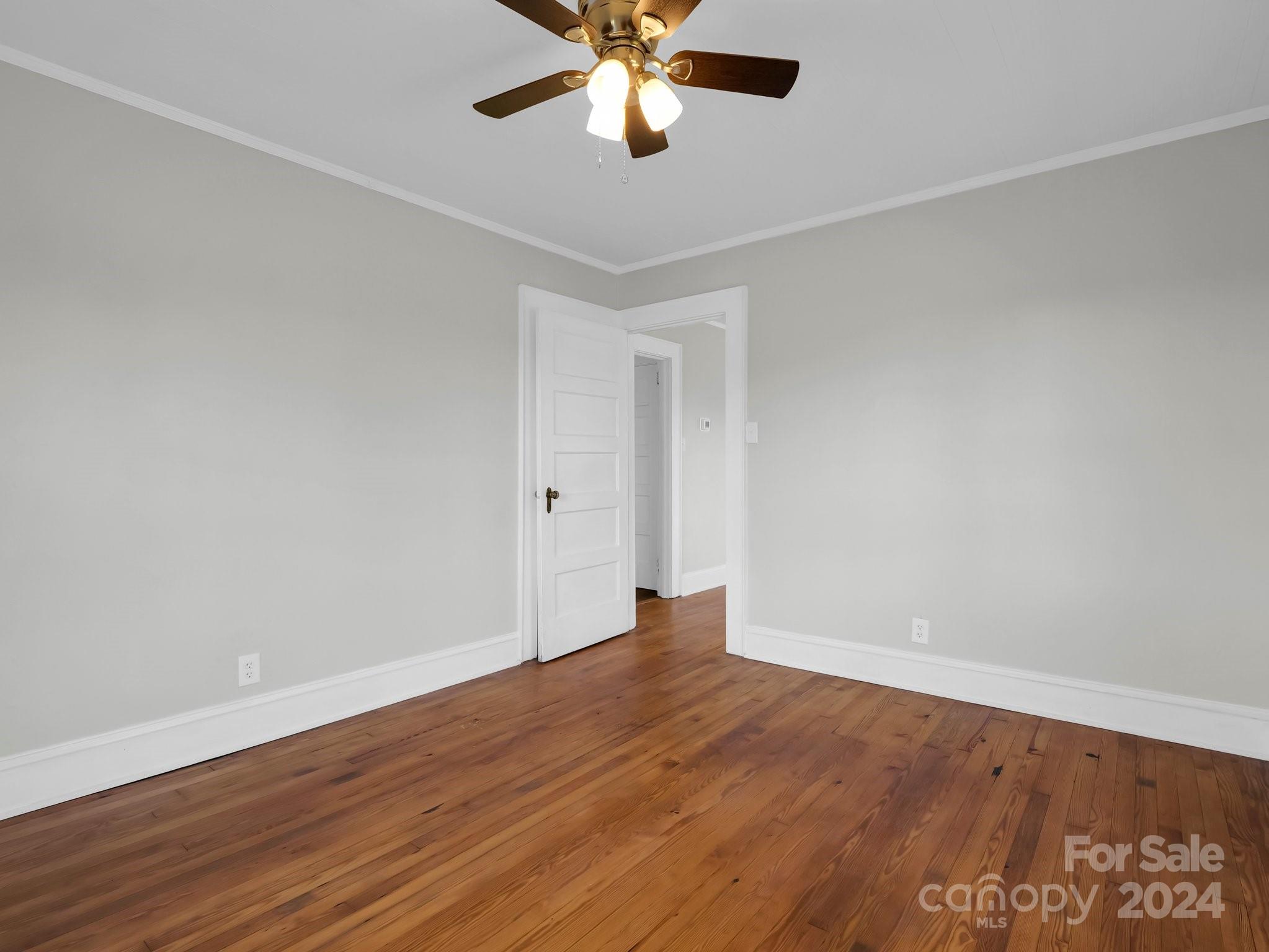 574 Cat Square Road Lincolnton, NC 28092 - Photo 24 of 48 a view of an empty room with wooden floor