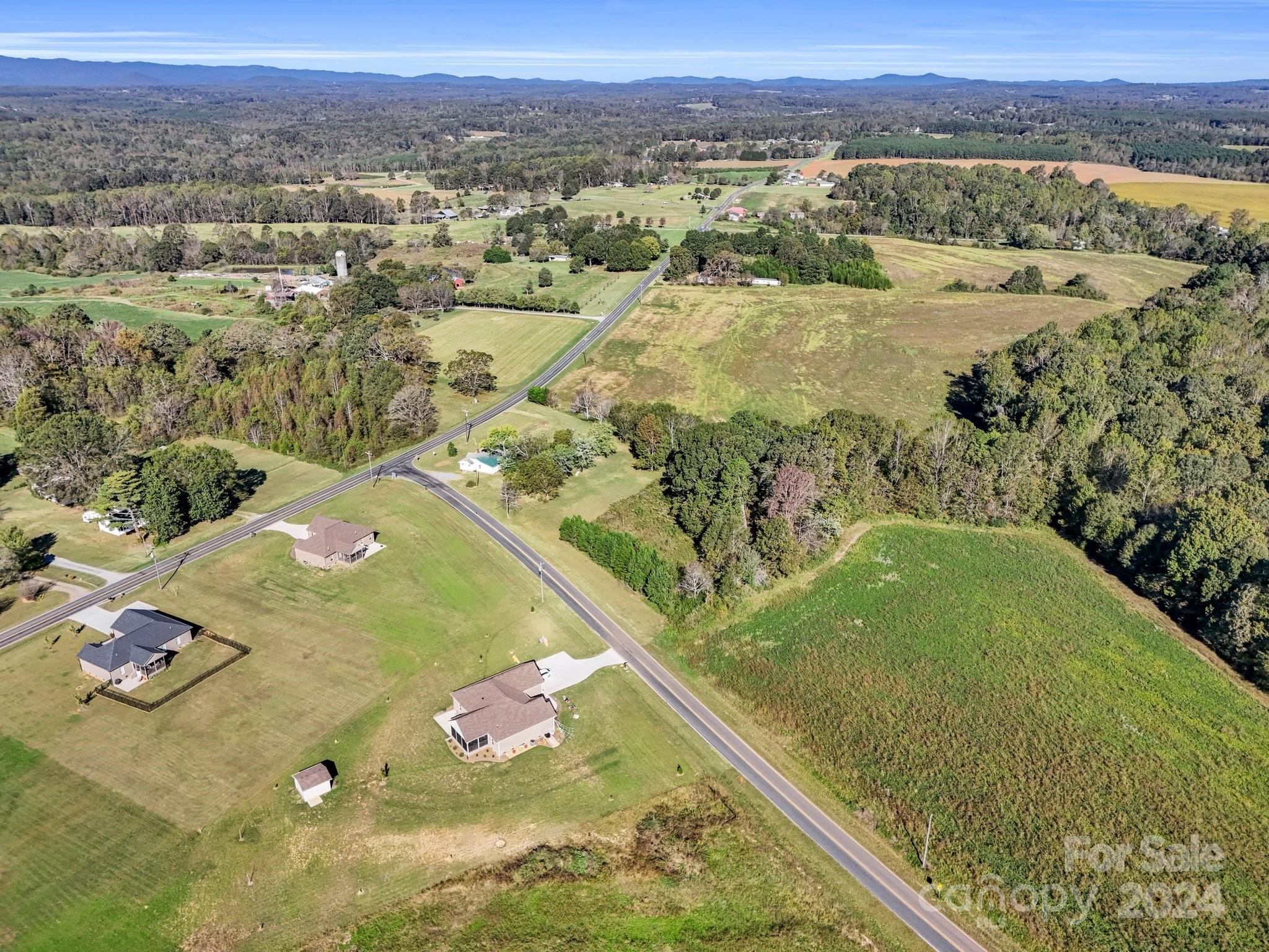 574 Cat Square Road Lincolnton, NC 28092 - Photo 39 of 48 a view of a lake with a mountain