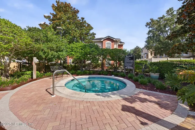 a view of a livingroom with furniture and garden