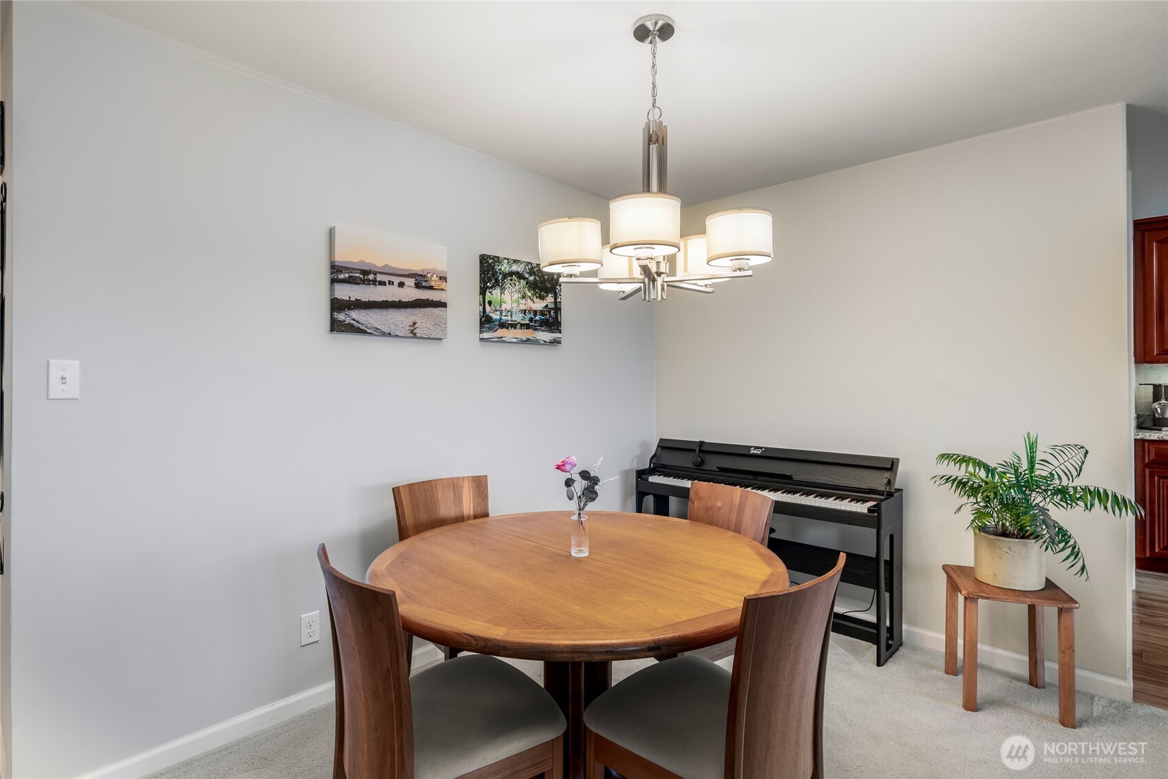 1020 5th Avenue South, Unit 8 Edmonds, WA 98020 - Photo 11 of 28 a view of a dining room with a table and chairs