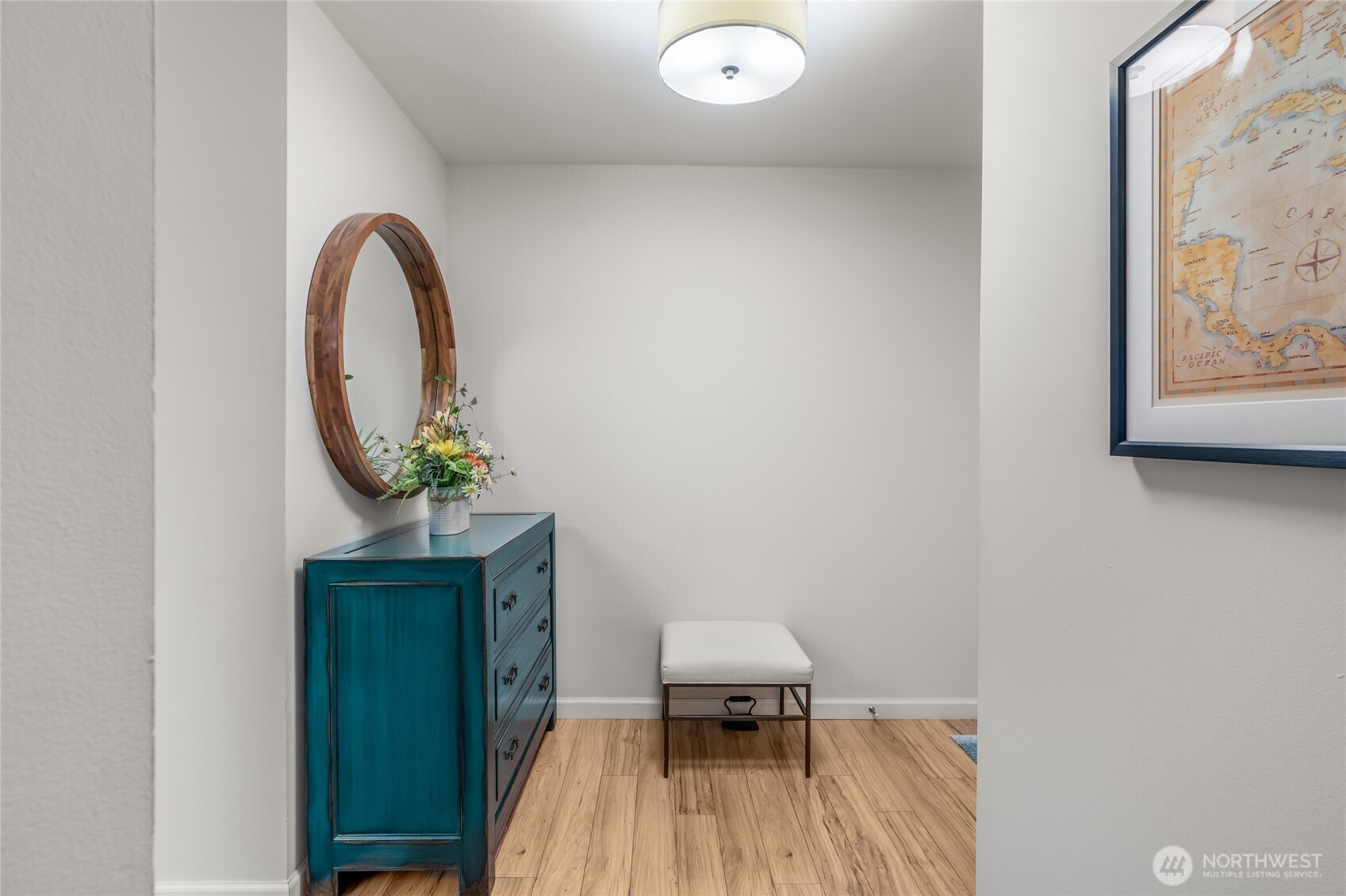 1020 5th Avenue South, Unit 8 Edmonds, WA 98020 - Photo 22 of 28 a view of a livingroom with furniture and wooden floor