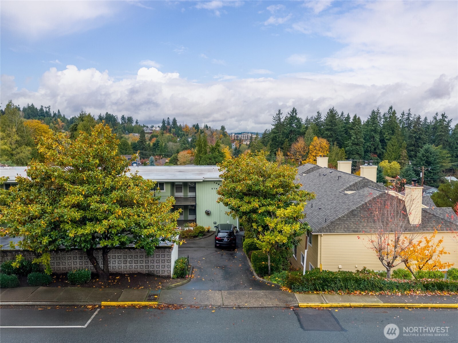 1020 5th Avenue South, Unit 8 Edmonds, WA 98020 - Photo 23 of 28 an aerial view of a house with a garden and pathway