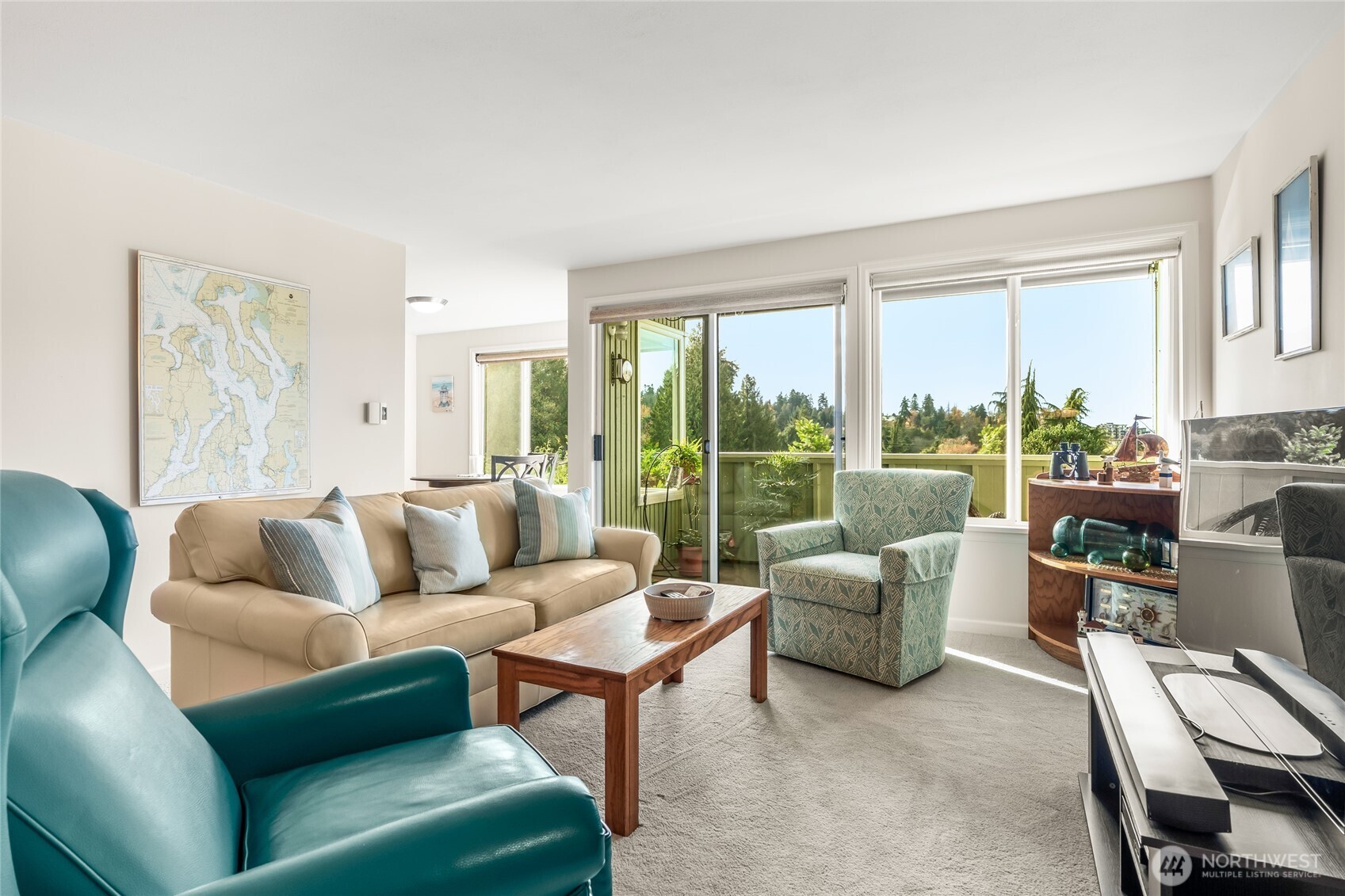 1020 5th Avenue South, Unit 8 Edmonds, WA 98020 - Photo 7 of 28 a living room with furniture and a large window